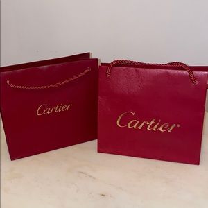 Two small Cartier bags